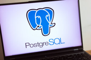 PostgreSQL relational database management system logo displayed on laptop computer screen
